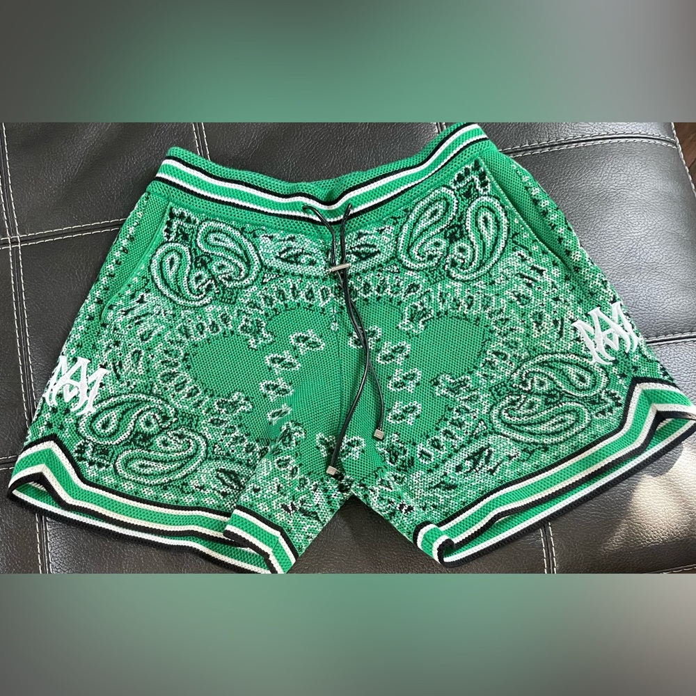 A pair of basically brand new  Amiri green bandanna shorts